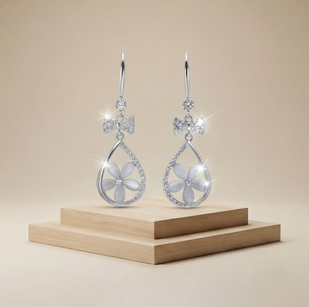 925 Sterling Silver Floral Teardrop Earrings with Bow Detail High Polish Rhodium Jewellery