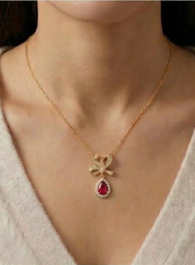 AGOR 925 Sterling Silver Ribbon Bow Pendant Necklace Jewellery with Red Stone in Gold Plated Finish