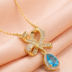 925 Sterling Silver Ribbon Bow Pendant Necklace Jewellery with Blue Stone in Gold Plated Finish