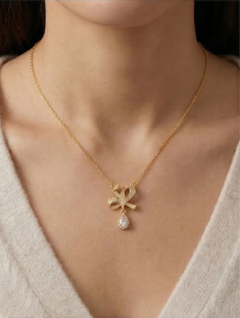AGOR 925 Sterling Silver Ribbon Bow Pendant Necklace Jewellery with Clear Stone in Gold Plated Finish