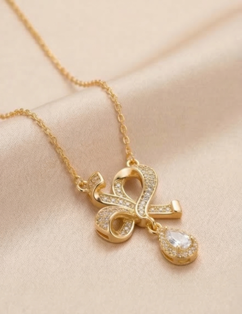 AGOR 925 Sterling Silver Ribbon Bow Pendant Necklace Jewellery with Clear Stone in Gold Plated Finish